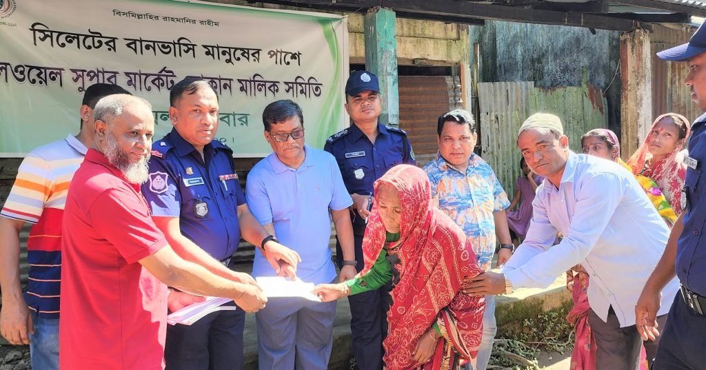 গোয়াইনঘাট থানা পুলিশের  উদ্যোগে ১৪০০ জন মানুষের মাঝে শুকনো খাবার বিতরন